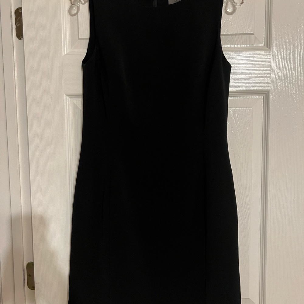 Black sleeveless sheath dress